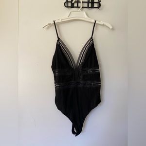 Black lace body suit